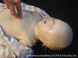 Chest compression using two finger technique on infant